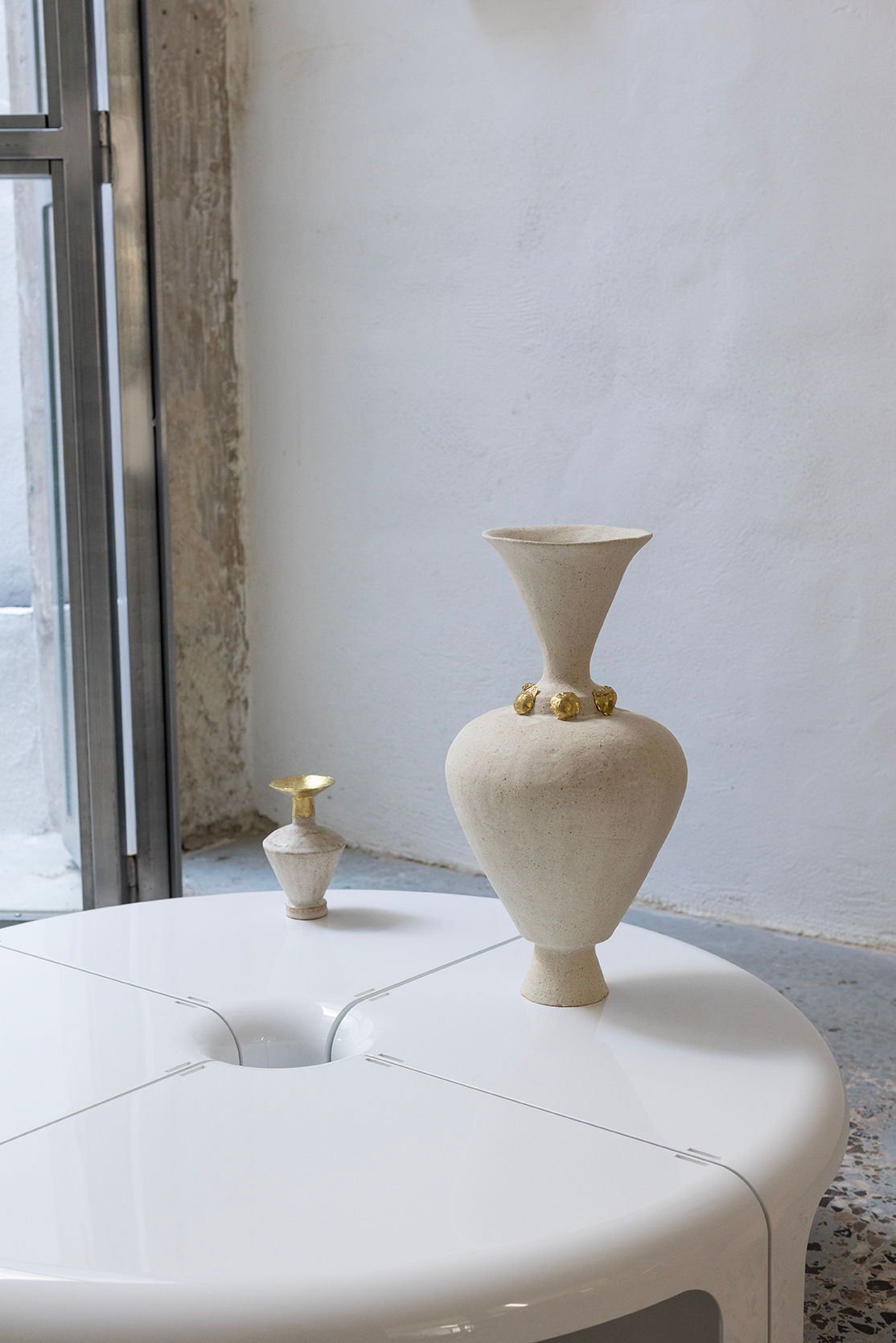 Simple decorative pieces arranged within a calm interior